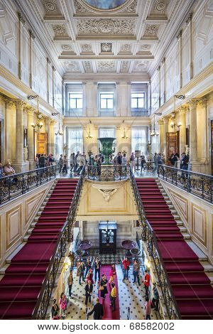 SAINT PETERSBURG, RUSSIA - SEPTEMBER 8, 2013: Visitors tour the Hermitage Museum. Founded in 1764, it is one of the oldest museums in the world.