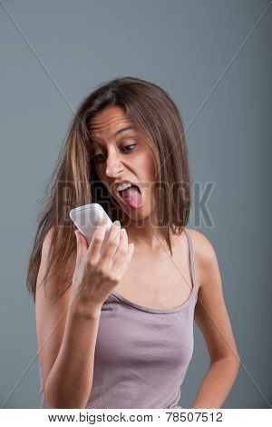 Disappointed Woman Making Grimaces To Phone