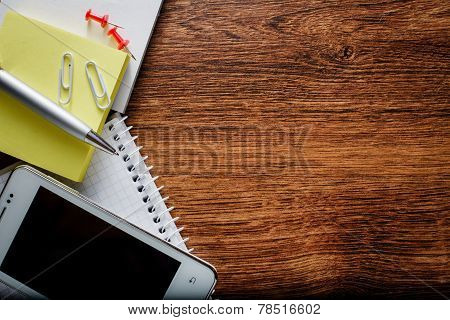 Office Or School Supplies With Phone On Table