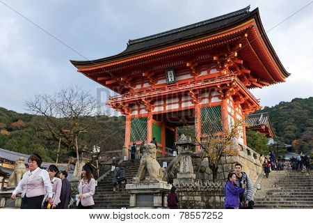 KYOTO, JAPAN: DECEMBER 1, 2014: Tourist and devotees visit the Kiyomizu-dera temple in autumn. This temple was established in 778 and is listed on the UNESCO World Cultural Heritage List.