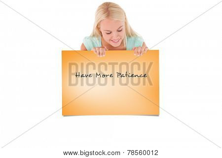 Woman looking at a whiteboard against orange card
