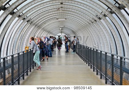 Paris, France - May 13, 2015: People Visit Glass Tube Corridor At Pompidou Centre