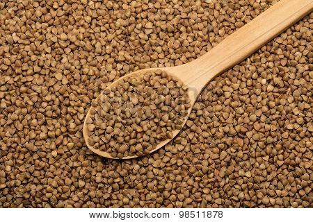 buckwheat in a wooden spoon