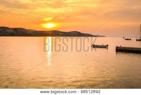 Peaceful Sunset By The Sea With Boats And Sailship