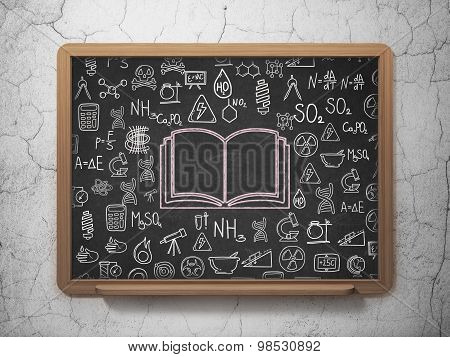Science concept: Book on School Board background