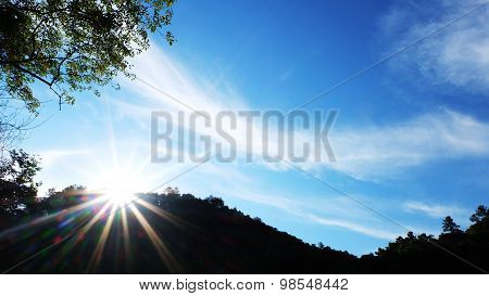 Hiking journey with sunny light and blue sky