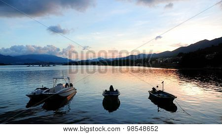fishing boats on the lake