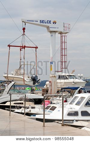 SELCE, CROATIA - JULY 24, 2015: A boat lift in Marina Selce