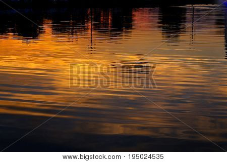 bridge night city reflected in water with lights and reflections. Uzghorod Uzhhorod