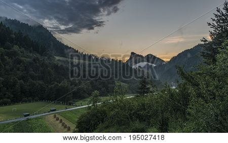 Sunset in Lesnica village after summer storm