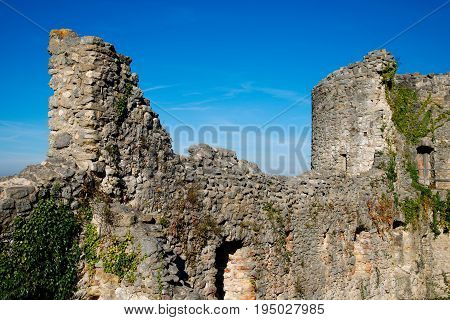 Stone wall and tower of the Dorneck castle in Switzerland on a sunny day