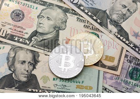 Dollar cash background, banknote and golden and silver cruptycurrency bitcoin coins. High resolution photo.