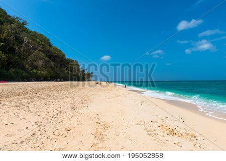 BORACAY WESTERN VISAYAS PHILIPPINES - JANUARY 14 2015: Few people at the beach in a sunny day in Puka Beach Boracay