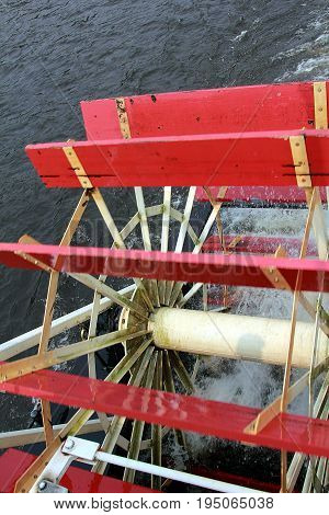 The Big Paddle Wheel From a Steamboat Propelling the Boat over the Water
