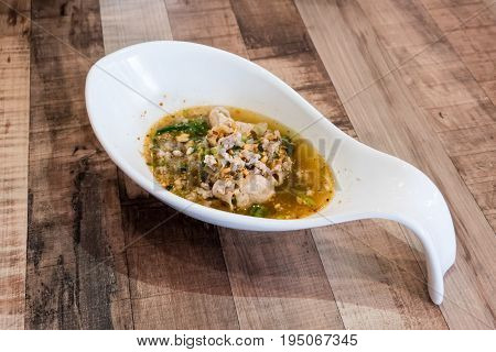 Tomyum Noodle Soup With Ground Pork And Peanut