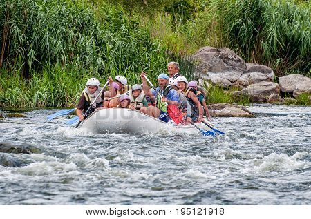 Village Myhia Mykolayiv region South Bug River Ukraine - July 9 2017: Rafting and kayaking. A popular place for extreme family and corporate recreation as well as training for athletes.