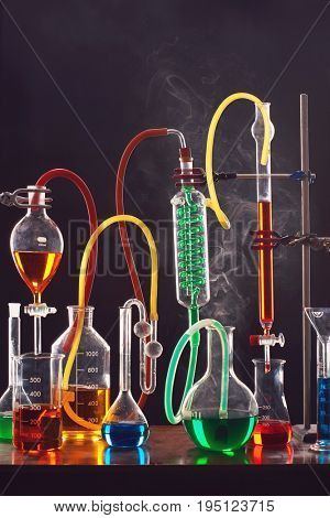 Science equipment including test tubes and flasks