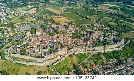 Aerial top view of Carcassonne medieval city and fortress castle from above, Sourthern France