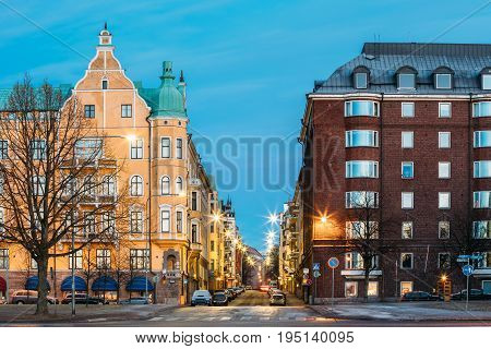 Helsinki, Finland. Residential House Building At Intersection Of Merikatu, Neitsytpolku And Puistokatu Streets In Winter Morning Evening. Ullanlinna Neighbourhood, District