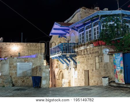 Tel Aviv -Yafo Israel July 08 2016: Quiet streets of the old town of Yafo at night. Lane sign of the zodiac Libra in old city Yafo Israel.