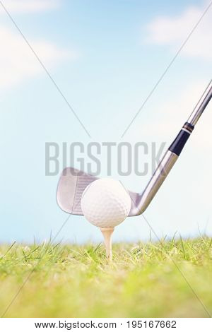 Golf Club Teeing Off Ball