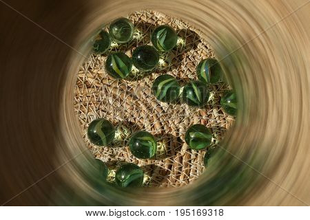 Marbles 4. Green marbles and their shadows on wicker
