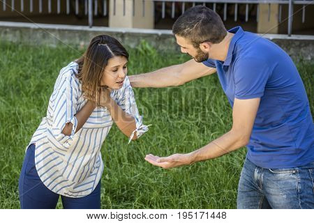 guy making the heimlich maneuver to a girl while she's choking