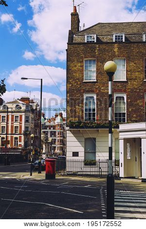 LONDON UNITED KINGDOM - August 6th 2016: Detail of beautiful buildings architecture in the streets of London city centre near Grosvenor Square and Duke Street