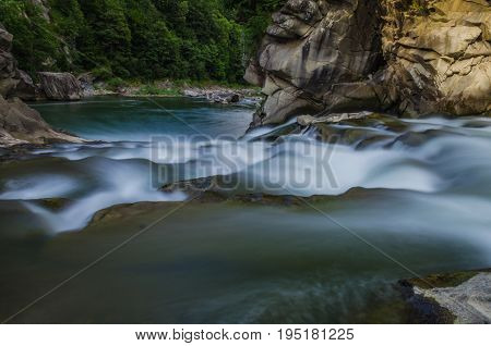 Background Landscape With Waterfall In Yaremche Vilage In Ukraine
