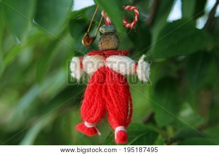 Typical Martenitsa traditional gift in Bulgaria and some other countries on 1st day of spring during Martisor celebration (at the photo - Pizho the male doll)