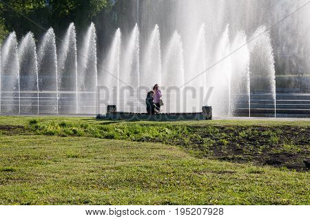 Yekaterinburg, Russia - May 31, 2017: Two Women On The Embankment Near The Waterworks On The Iset Ri