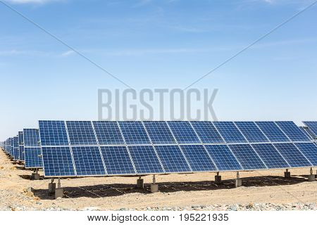 solar panels on the gobi desert new energy against a blue sky