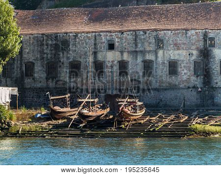 Wooden Slipway And Rabelo Boats On The Bank Of The River Douro - Porto, Portugal