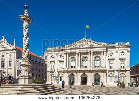 LISBON,PORTUGAL - MAY 18,2017 - View at the pillory with City hall of Lisbon. Lisbon is the capital of Portugal.