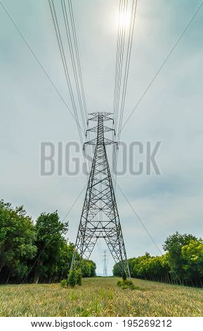 high voltage post.High-voltage tower sky background Twilight photo of power plant