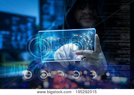 Hacker using clear tablet with HUD panel and code graph bar data analytsis element for cyber technology concept dark and grain process shallow depth of field select focus on hands
