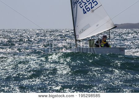 23 July 2015, Young sailors from around the World compete at the 2015 European Optimist Sailing Championships, held at the Welsh National Sailing Centre, Plas Heli, Wales. 