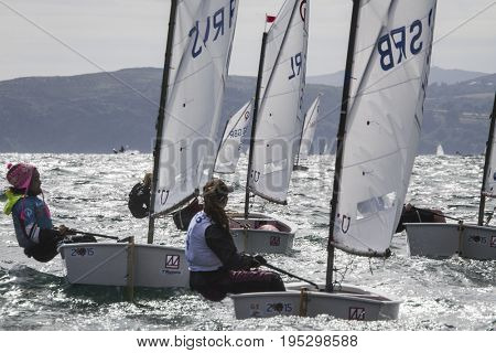 23 July 2015, Young sailors from around the World compete at the 2015 European Optimist Sailing Championships, held at the Welsh National Sailing Centre, Plas Heli, Wales. 
