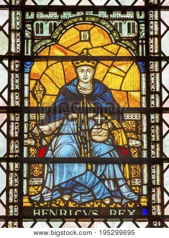 LONDON, ENGLAND - JANUARY 16, 2017 Henry 5 Stained Glass 13th Century Chapter House Westminster Abbey Church London England. Westminister Abbey has been the burial place of Britain's monarchs since the 11th century and is the setting for many coronations 