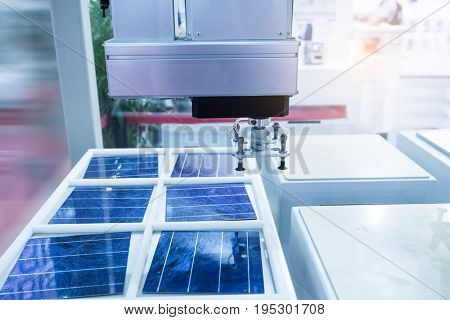 production of solar panels, Industrial robot working in factory,Conveyor Tracking Controler of robotic hand.