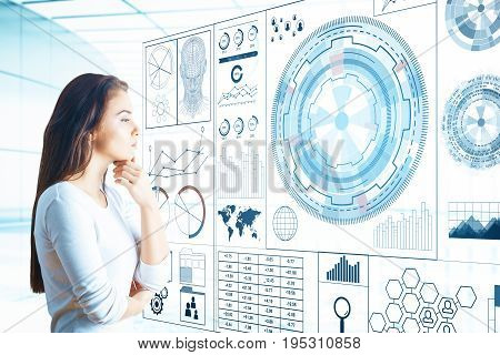 Thoughtful young european woman looking at large digital business hologram in bright room. Communication concept. 3D Rendering