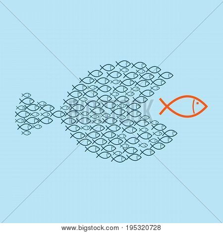 Teamwork concept. A group of small fish teaming up to eat a large fish.