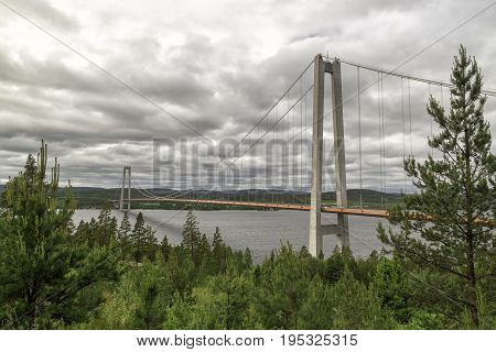 The High Coast Bride in Sweden with a cloudy sky.