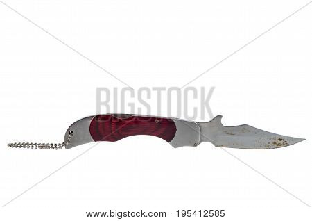 Knife. Rusty pocket hunting knife isolated on a white background.