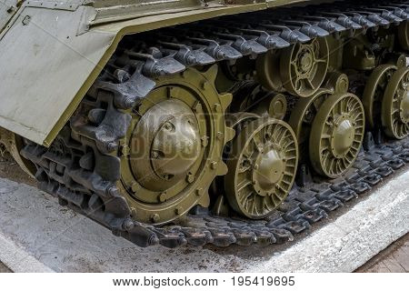 Tank Caterpillar Track with Wheels. The photo shows the tracks of a tank from the period of the Second World War.