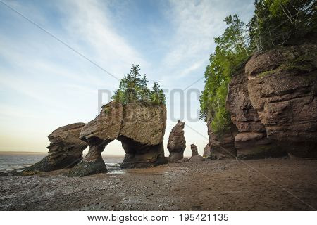 The icon Hopewell Rocks in New Brunswich. Popular tourist destination the Bay of Fundy has the highest tides in the world.