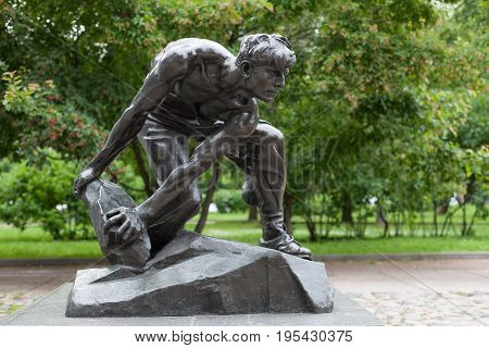 MOSCOW - JULY 5: Cobblestone As Wearon of Proletariat sculpture in Krasnopresnensky Square Park on July 5 2017 in Moscow. This Park is located in the center of Moscow.