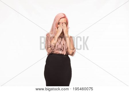 Young jocular woman portrait of a confident businesswoman showing presentation, pointing placard background. Ideal for banners, registration forms, presentation, landings, presenting concept.