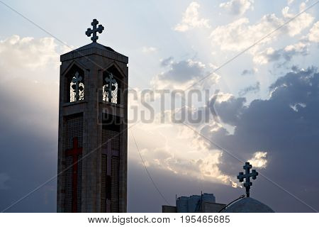 The Chatolic Church In The Light Of Cloudy Sunset
