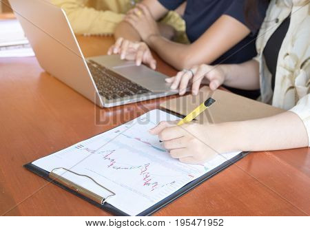 female hand drawing a graph of business.
Back to school education knowledge college university concept